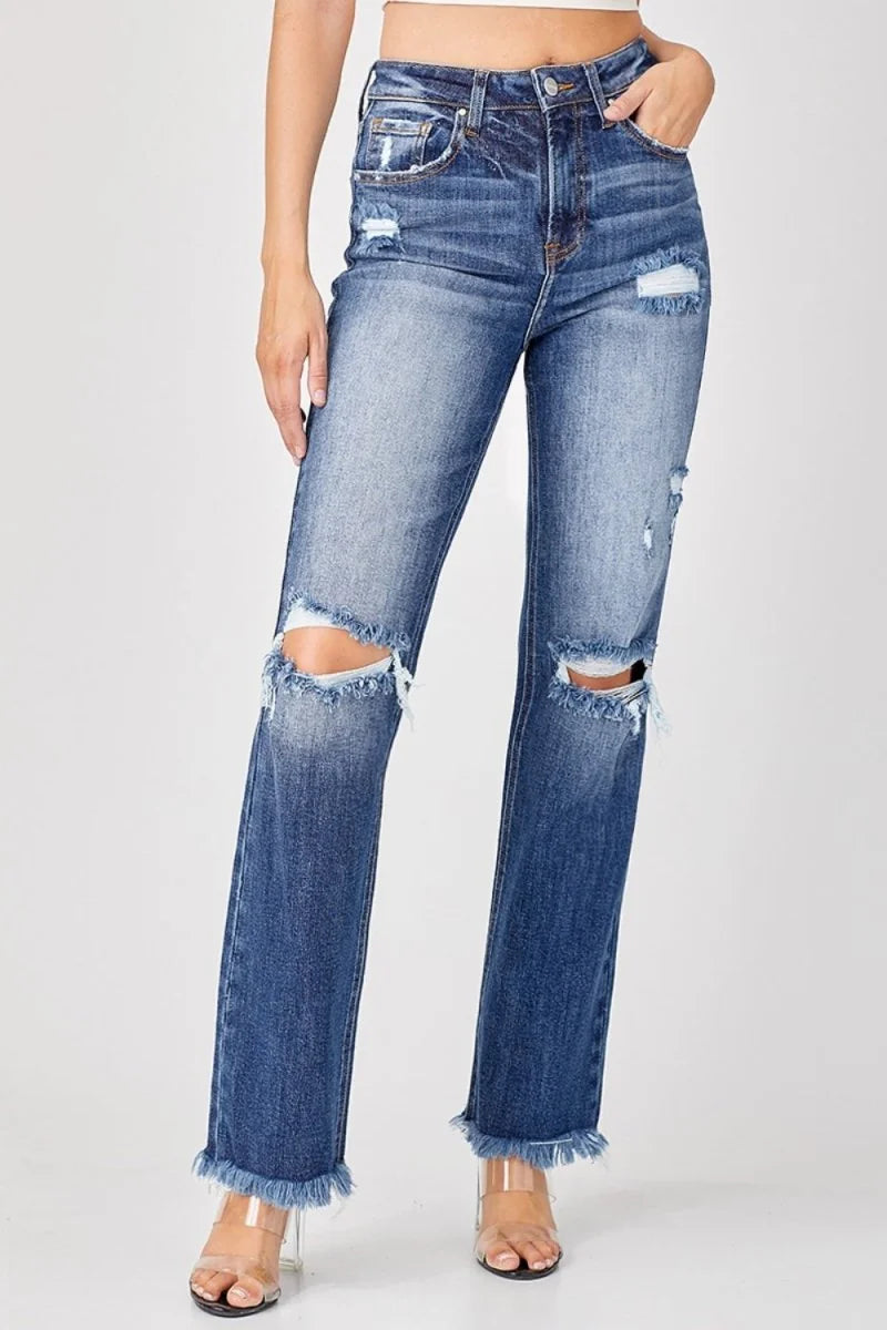 Deep blue distressed straight jeans with raw hem