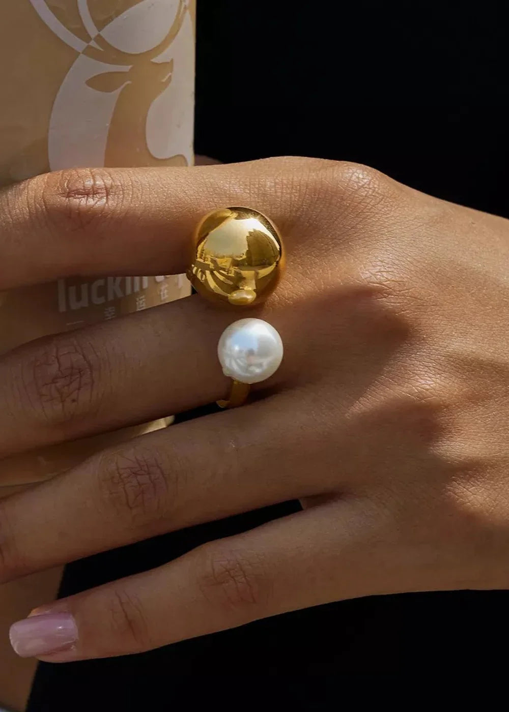 Gold-plated ring with an orb and pearl accent