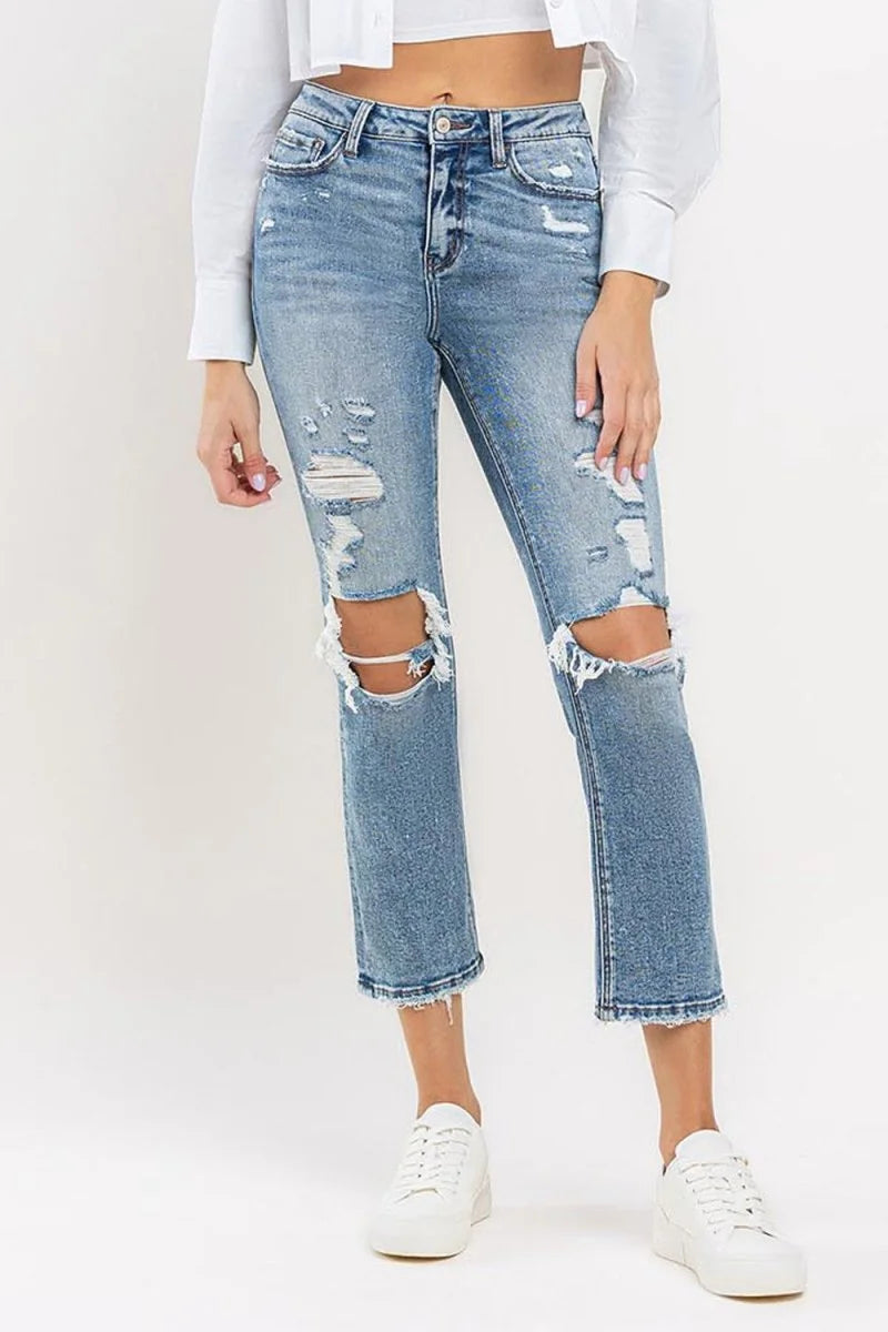 Medium wash high rise slim straight jeans with pockets