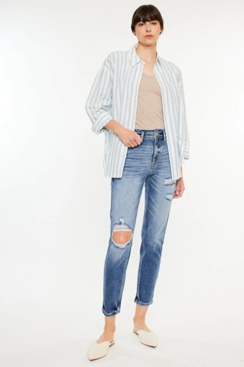 Medium wash high rise distressed mom jeans
