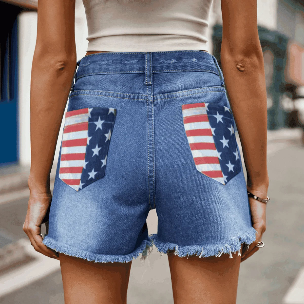Distressed denim shorts with US flag pattern