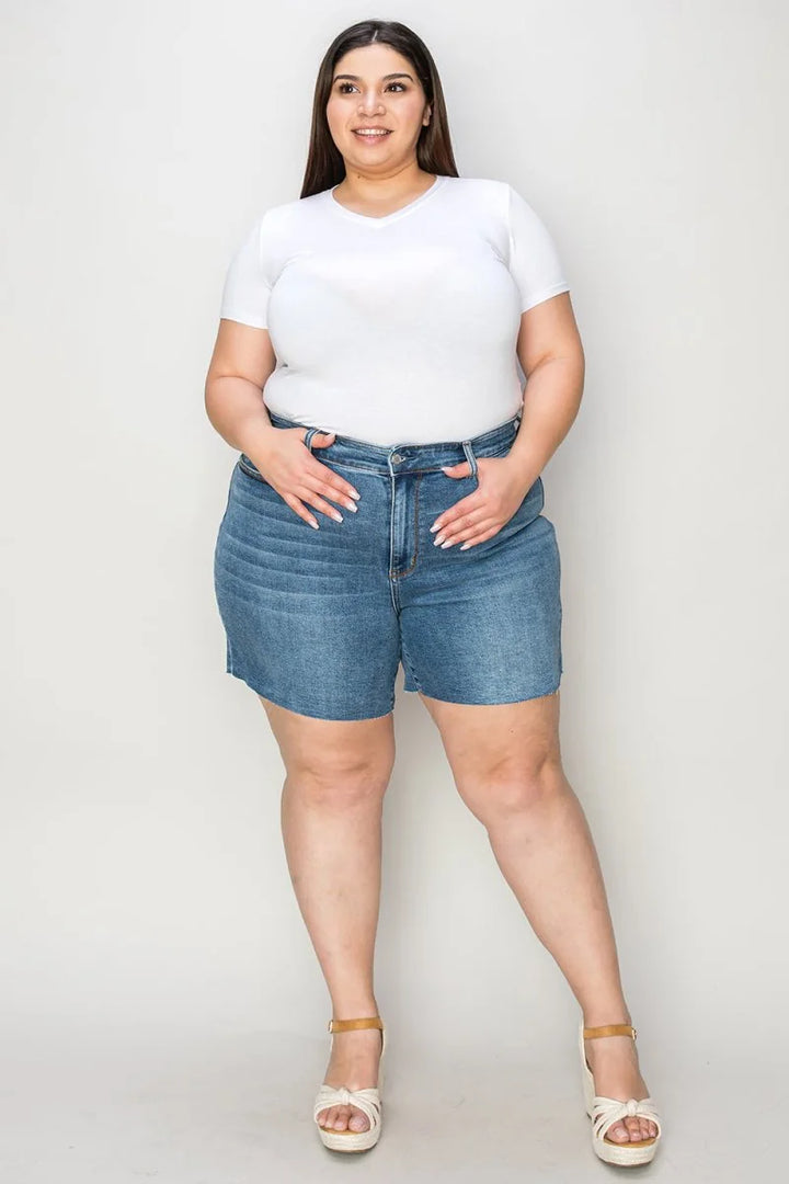 Blue denim shorts with a tie belt