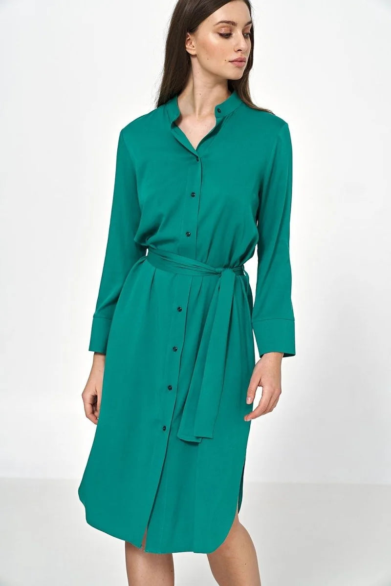 Green viscose shirt dress with a tie waist and button-down front.