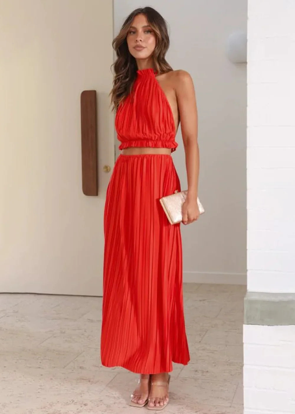 Women's red halter neck pleated skirt suit