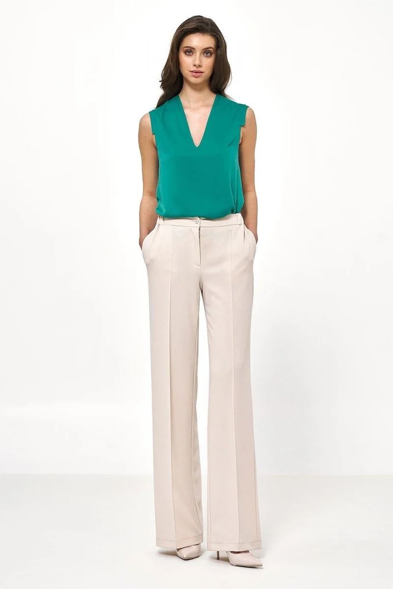 Beige loose cut women's trousers