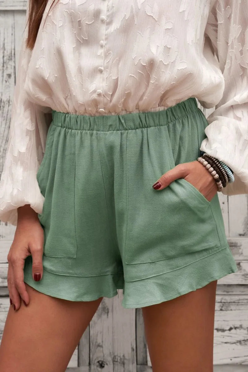 Sage elastic waist shorts with pockets