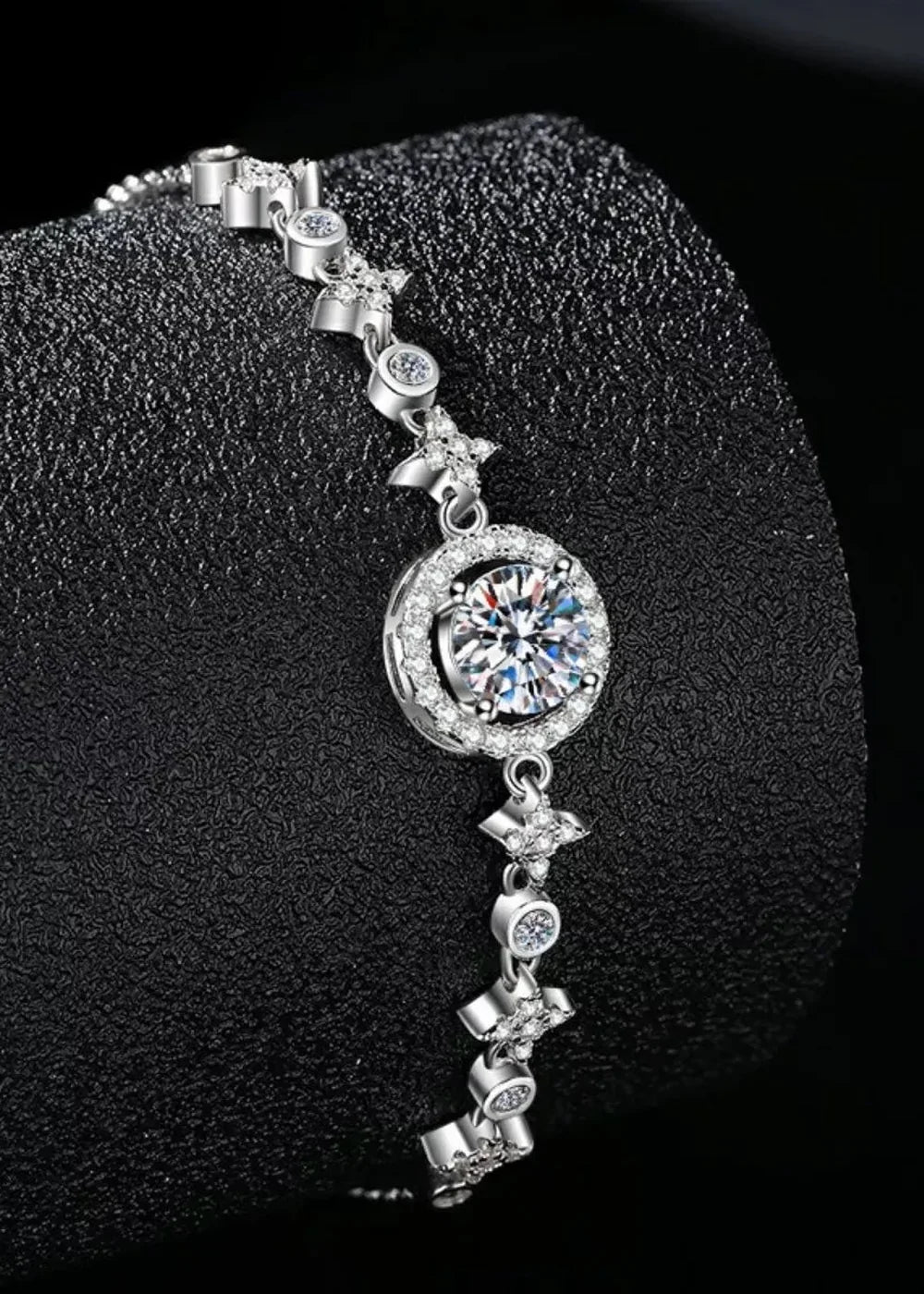 Minimalist sterling silver bracelet with a single moissanite stone