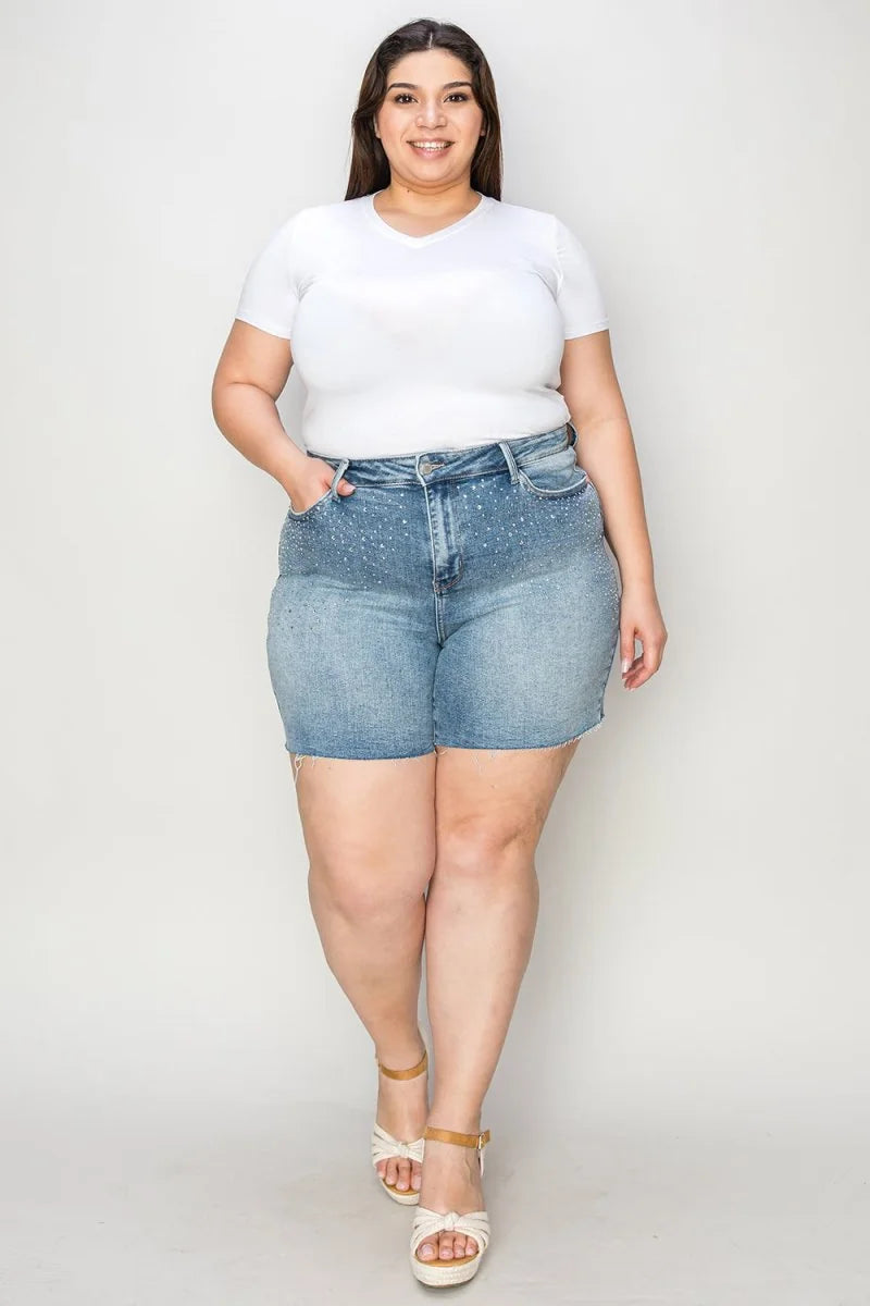 Light colored high waist denim shorts with rhinestone details