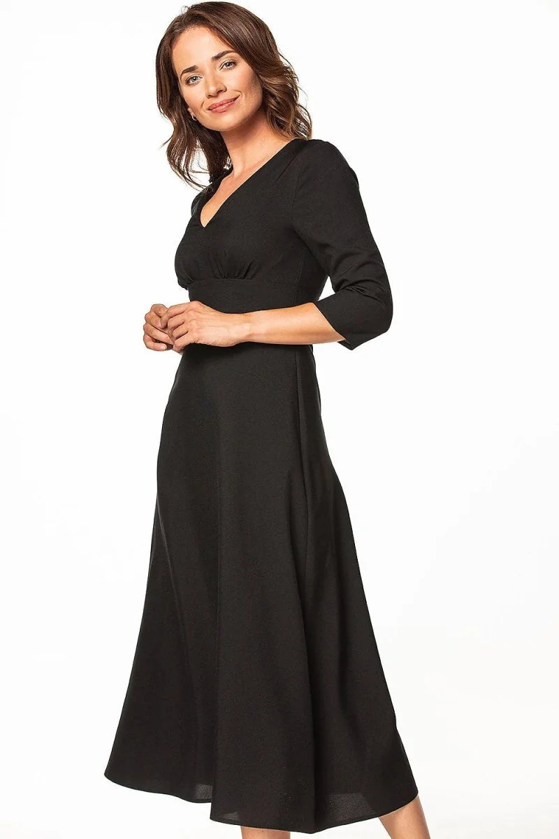 Black midi dress with a V-neck and three-quarter sleeves, featuring a fitted waist and a flared skirt.
