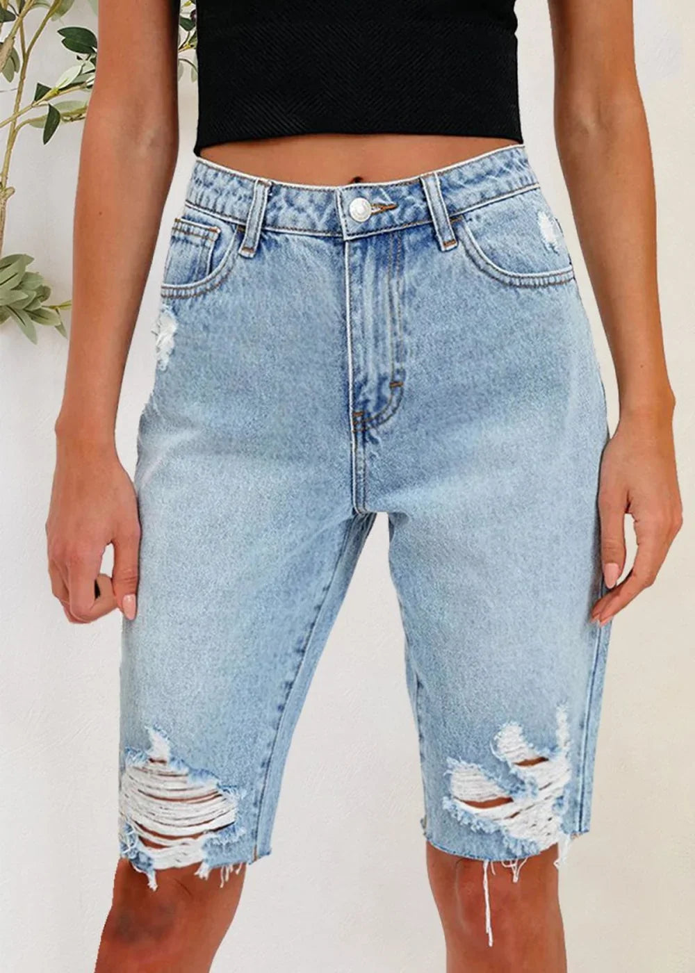 Light wash distressed denim shorts