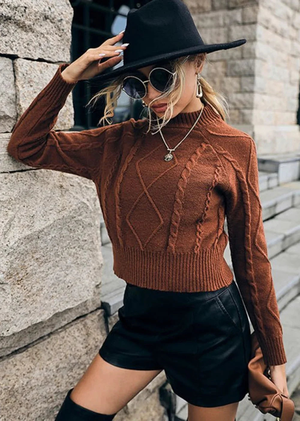 Coffee colored women's long sleeve sweater with twist detail