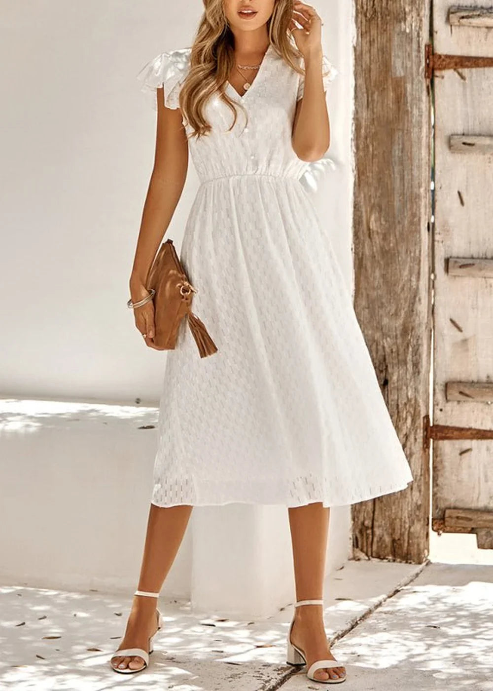 White V-neck cotton dress with short sleeves