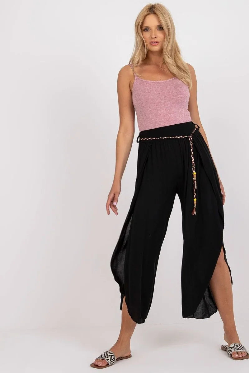 Black high waist trousers with decorative tie