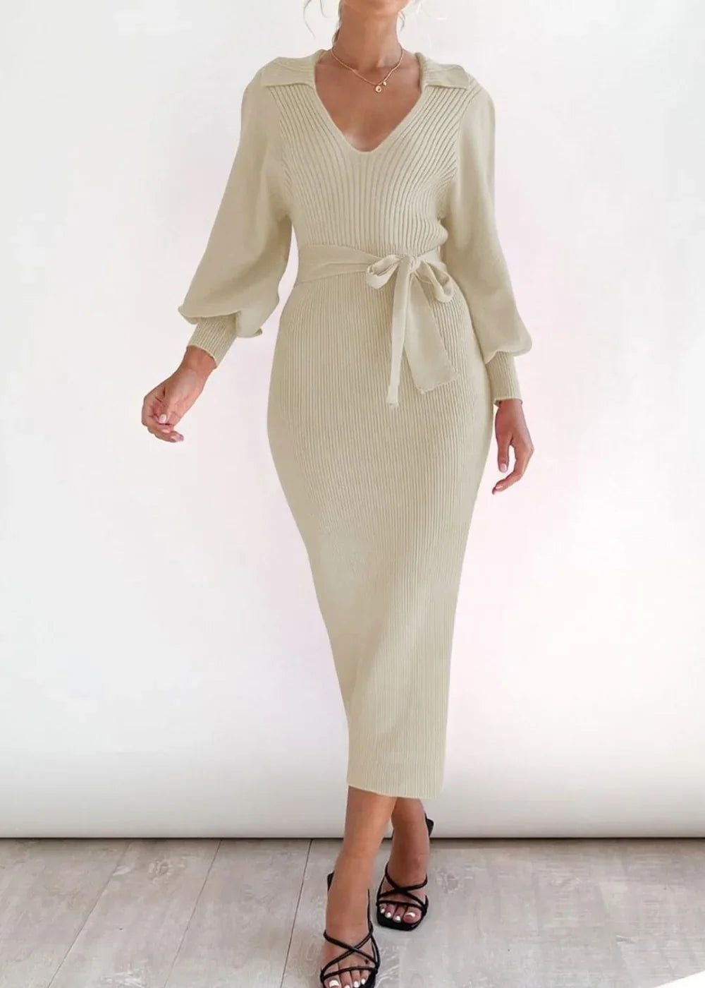 Cream long-sleeved wrap sweater dress with a tie detail