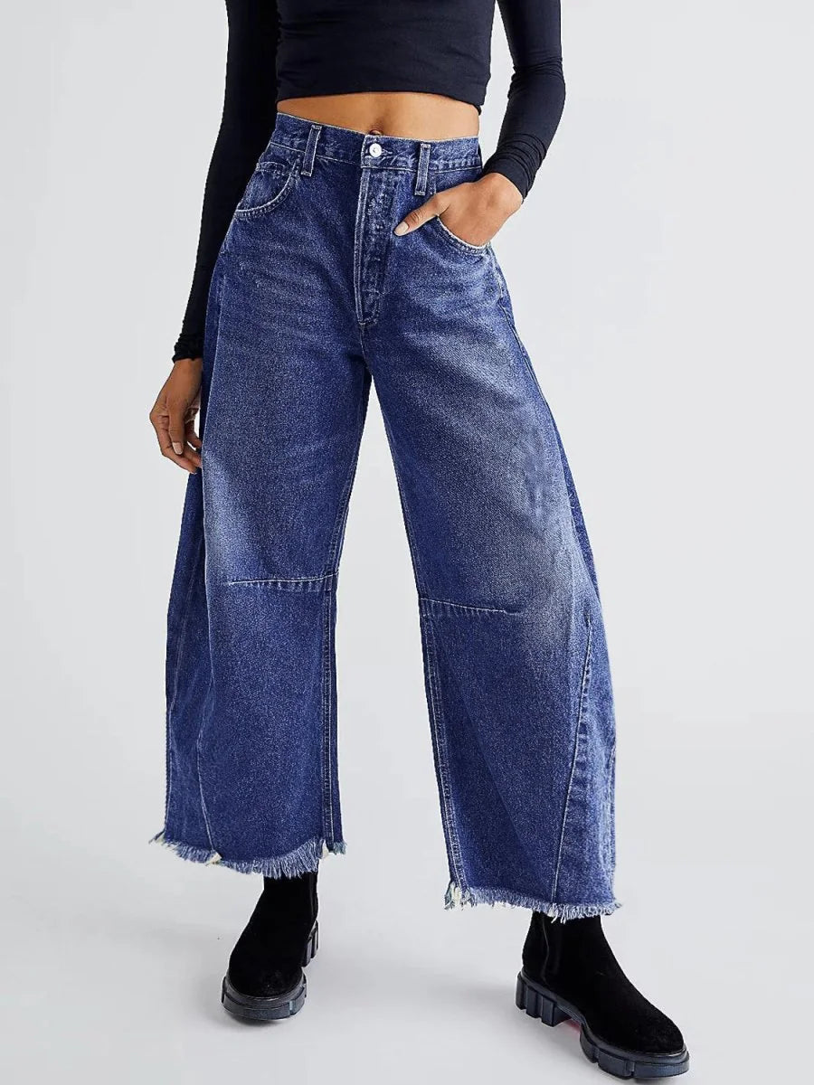 Medium wash raw hem wide leg jeans with pockets