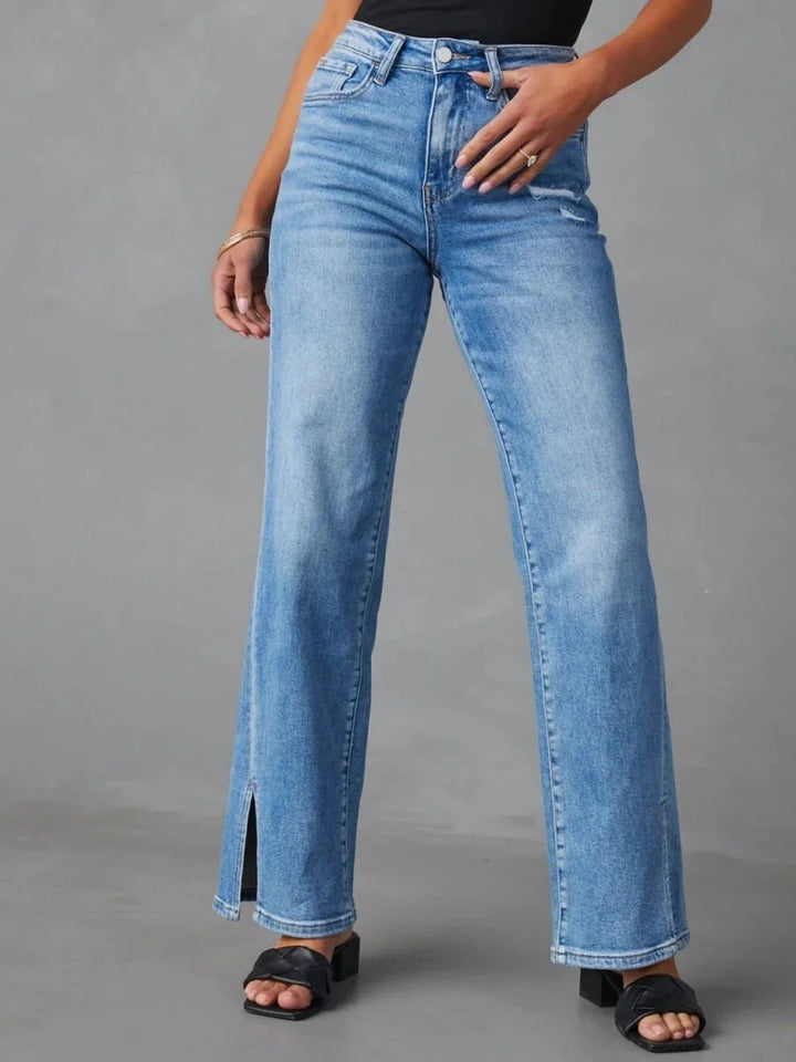 Medium wash slit buttoned jeans with pockets