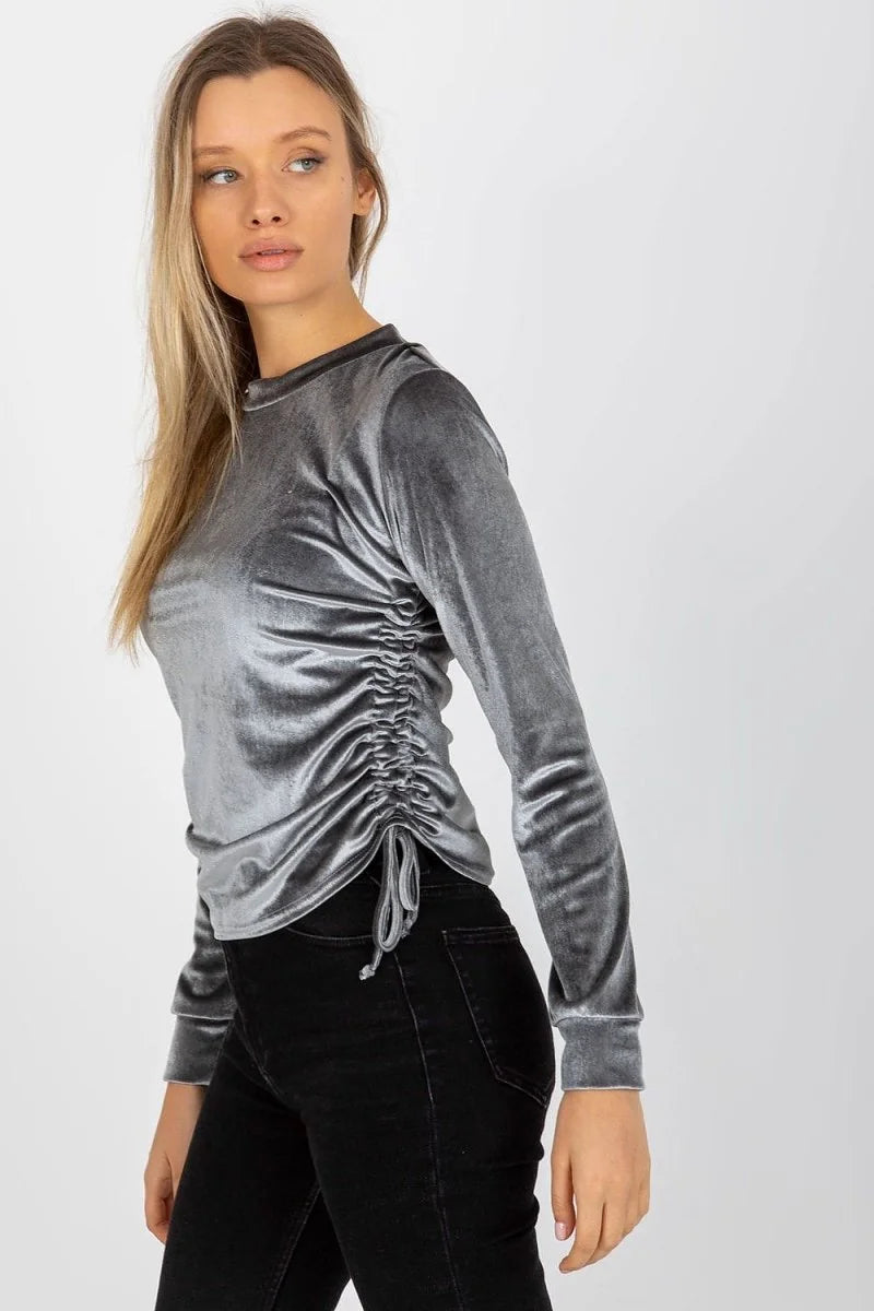 Grey velvet long-sleeve top with ruching and drawstring detail on the side.