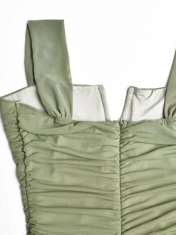 Sage green ruched mesh dress with square neckline and tank straps, close-up of zipper detail