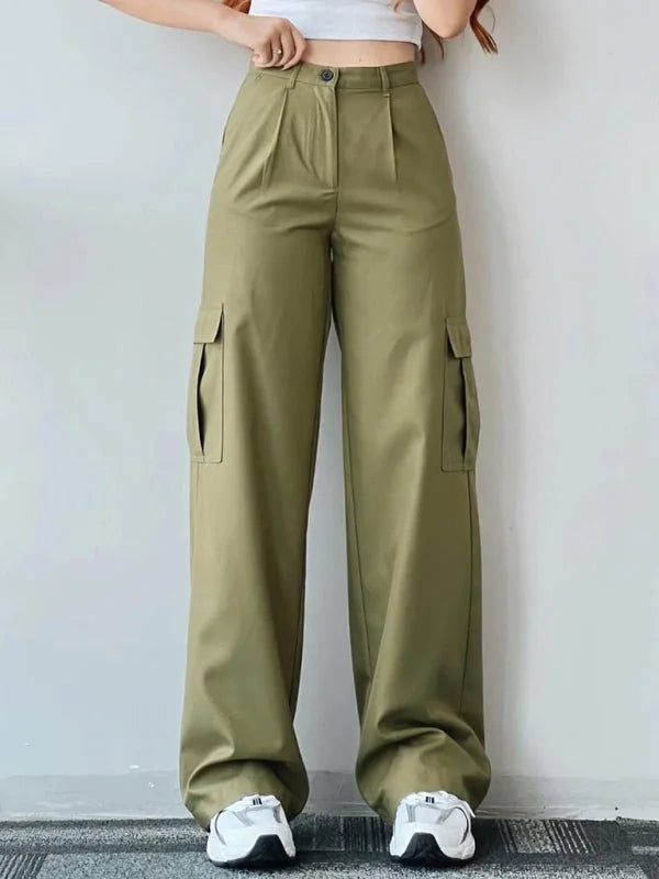 Khaki wide-leg cargo pants with pleats and side pockets, worn with white sneakers.