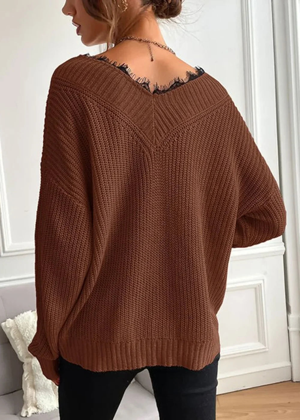 Brown v-neck knit sweater with black lace trim on shoulders and back.