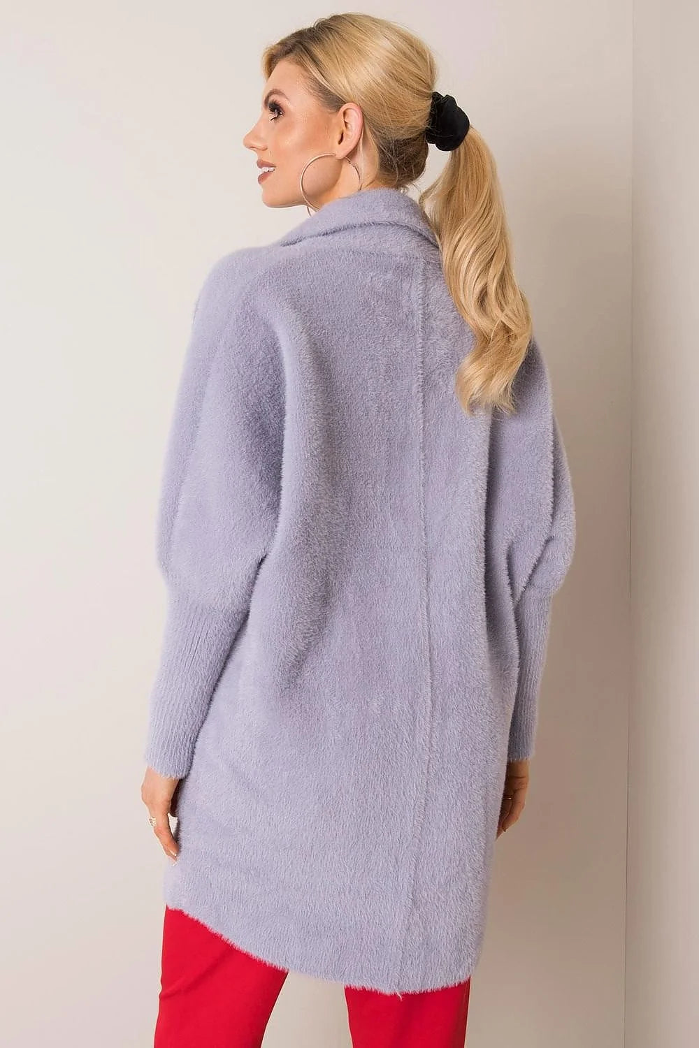 Lavender fuzzy angora blend cardigan with voluminous sleeves, worn by a model with red pants.