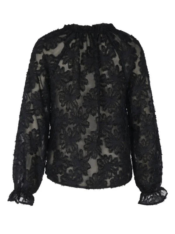 Detail of round neckline on black top