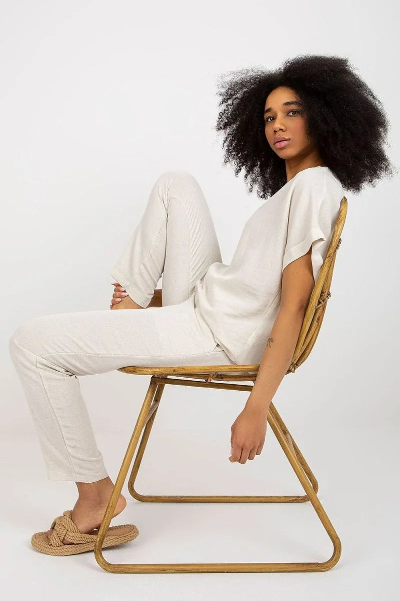 Close-up of the tie-waist detail on the pants