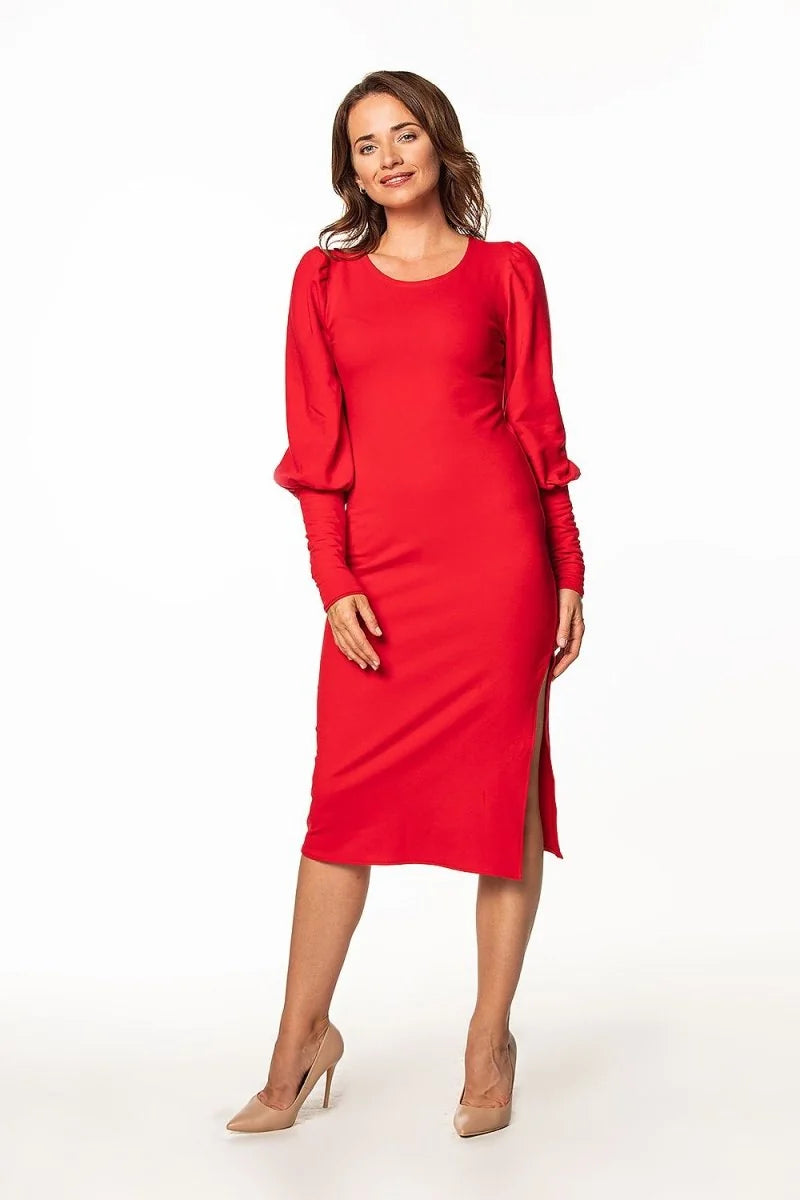 Red long-sleeved midi dress with puffed sleeves and a thigh-high slit, worn by a model.