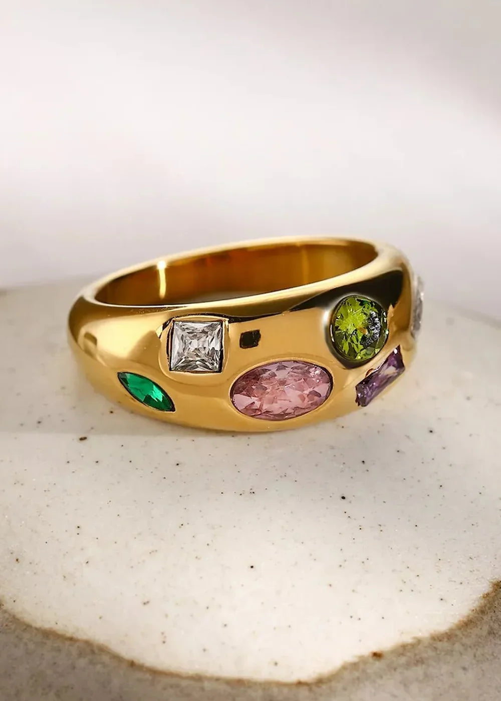 Close-up of a colorful zircon ring