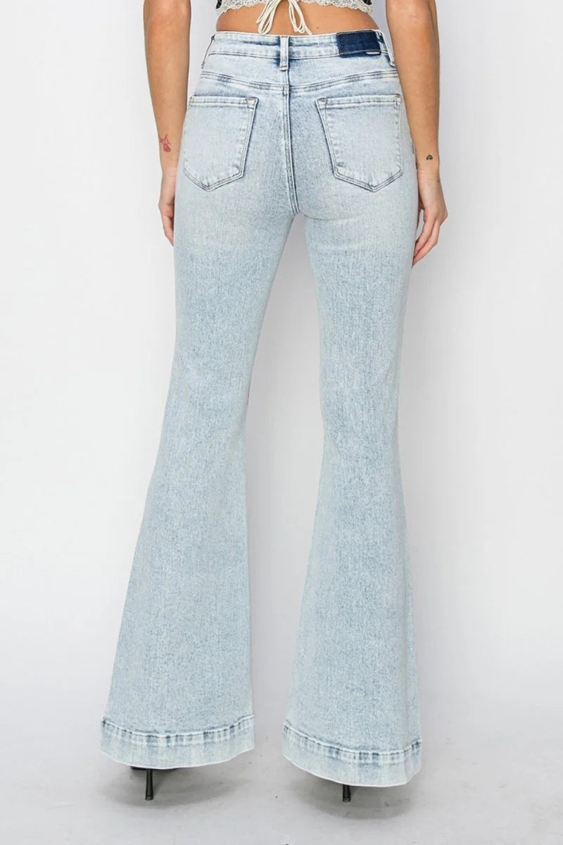 Detail of front patch pockets on flare jeans