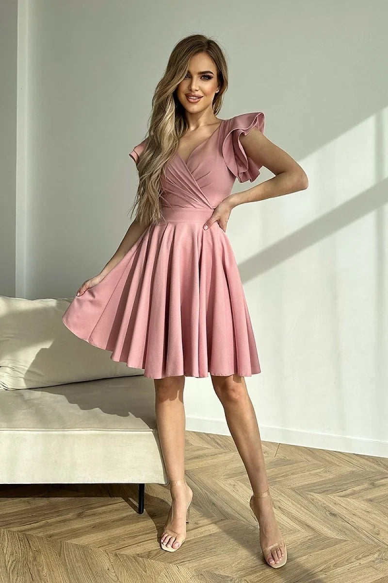 Beige cocktail dress with ruffled sleeves