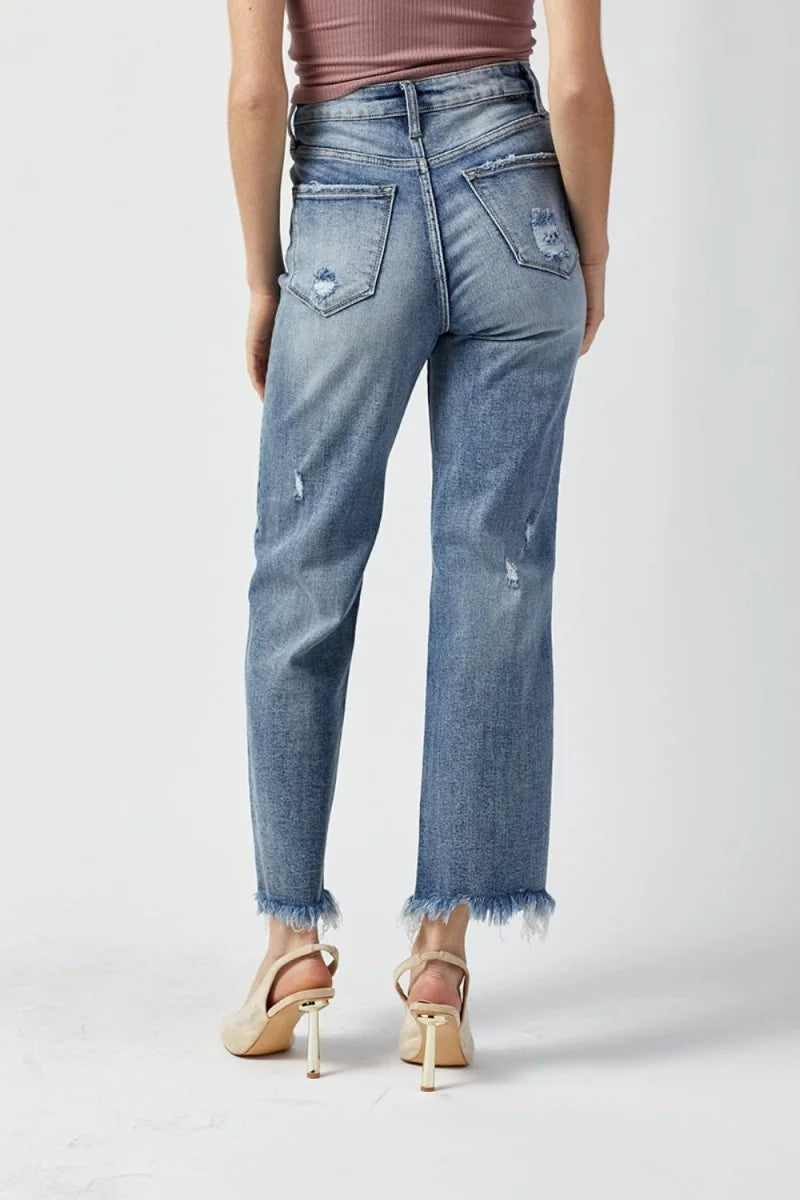 Model wearing the light wash straight leg jeans