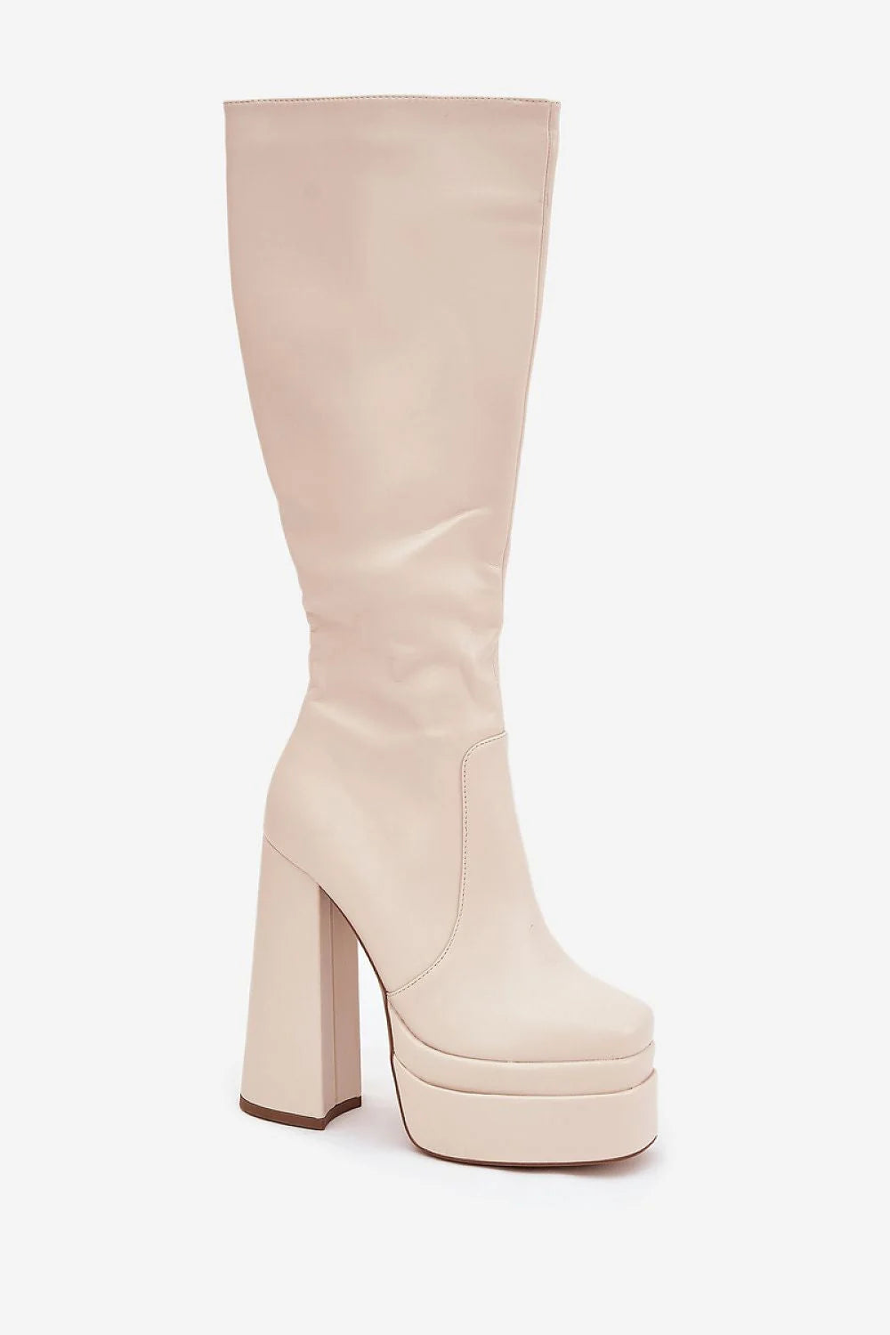 Close-up of the zipper detail on beige women's boots