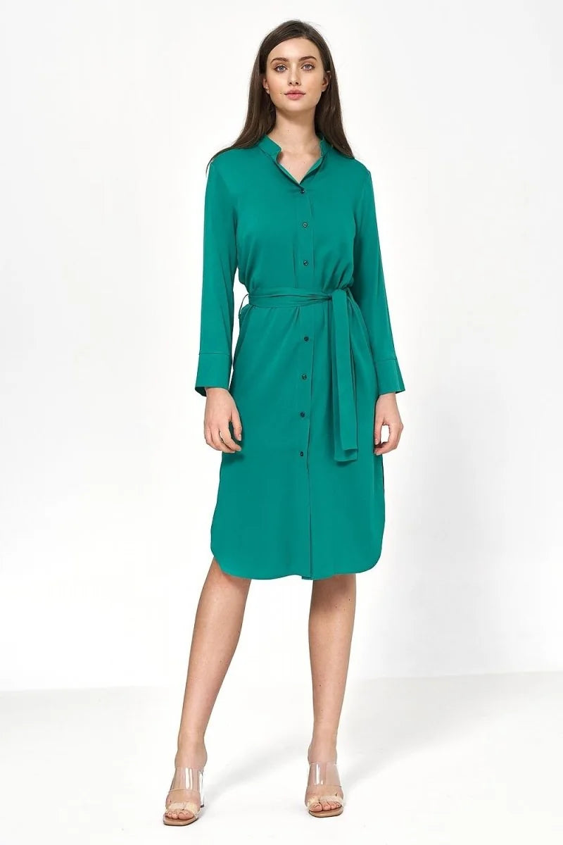 Green viscose shirt dress with a belt, long sleeves, and button-down front, shown full length on a model.