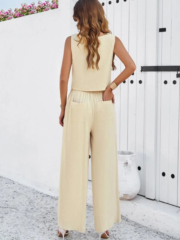 Model wearing olive green vest and trousers
