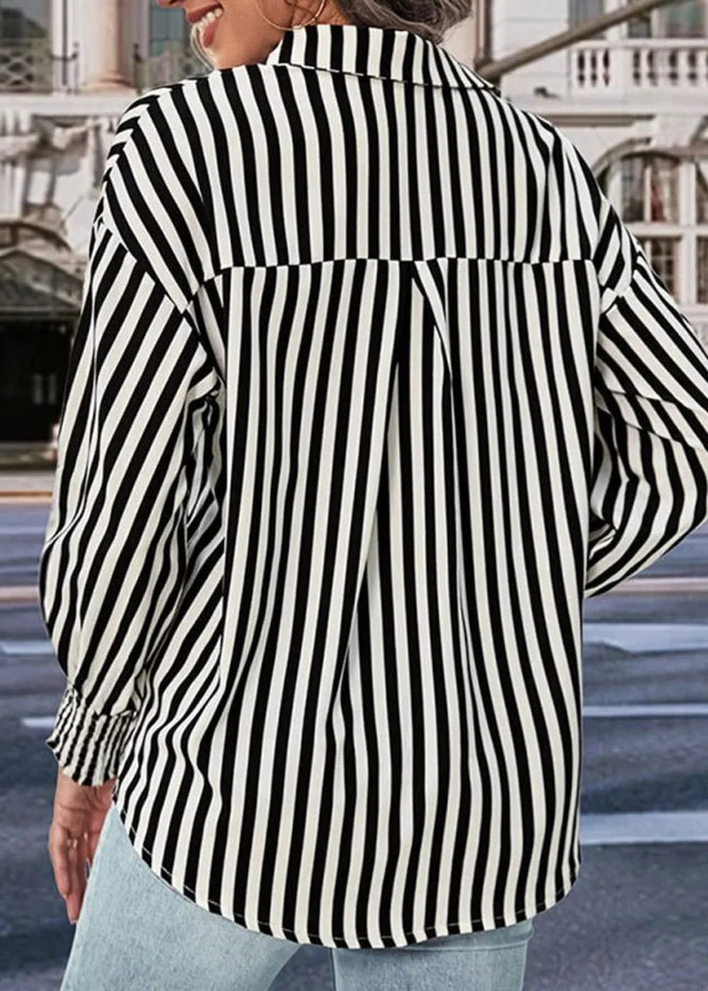 Close-up of striped fabric on a women's shirt