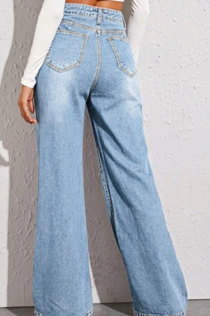 Close-up of tie belt on wide leg jeans