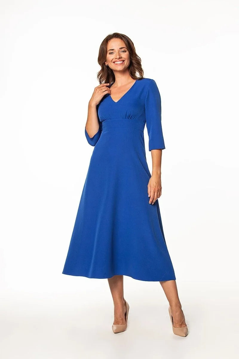 Detail of the creased bust on a blue maxi dress