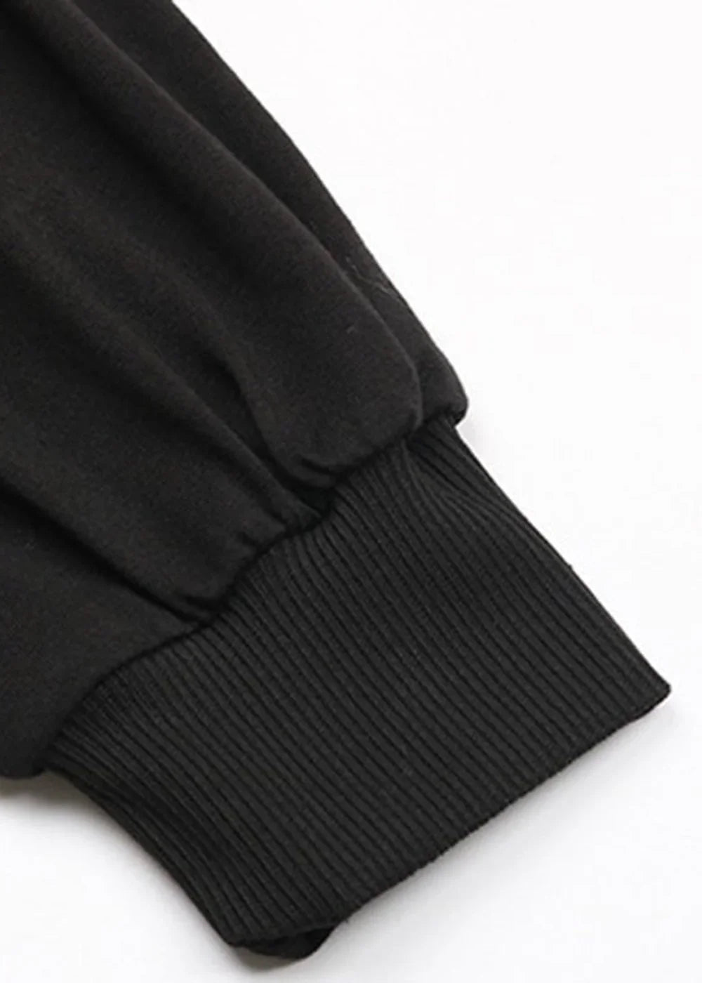 Close-up of bead embellishments on a black sweater