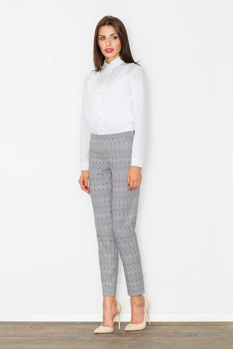 Close-up of the vibrant print on women's trousers