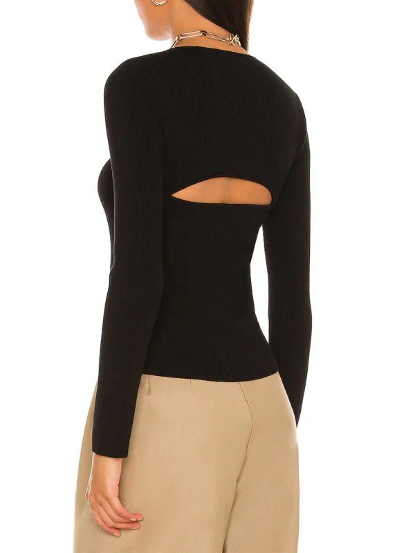 Model wearing the black knit blouse