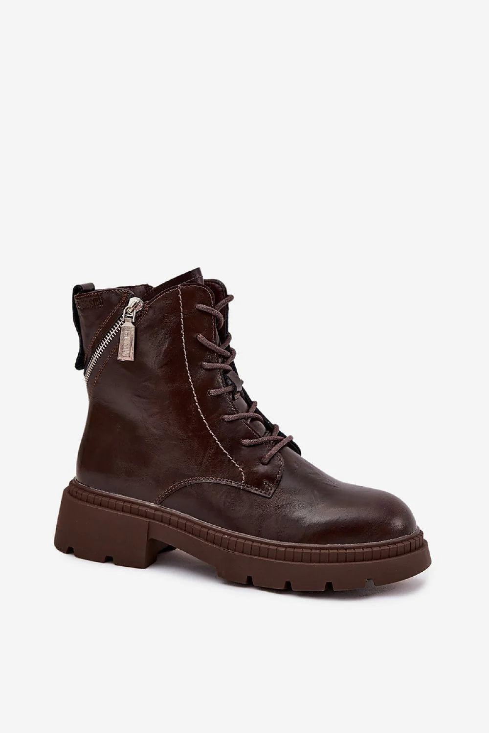 Brown leather lace-up boot with side zipper and lug sole.