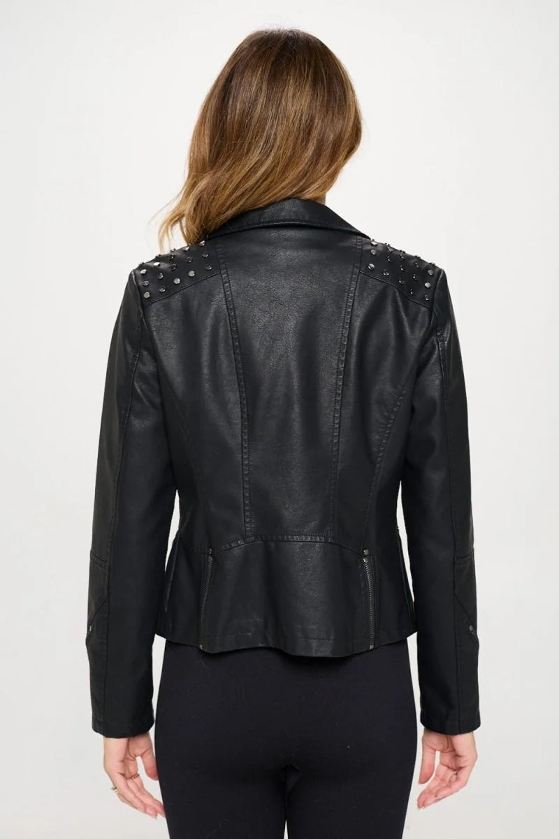 Close-up of studded detail on faux leather jacket