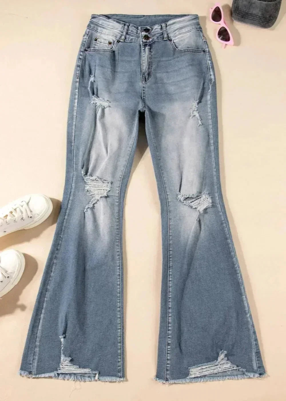 Close-up of distressed detailing on jeans