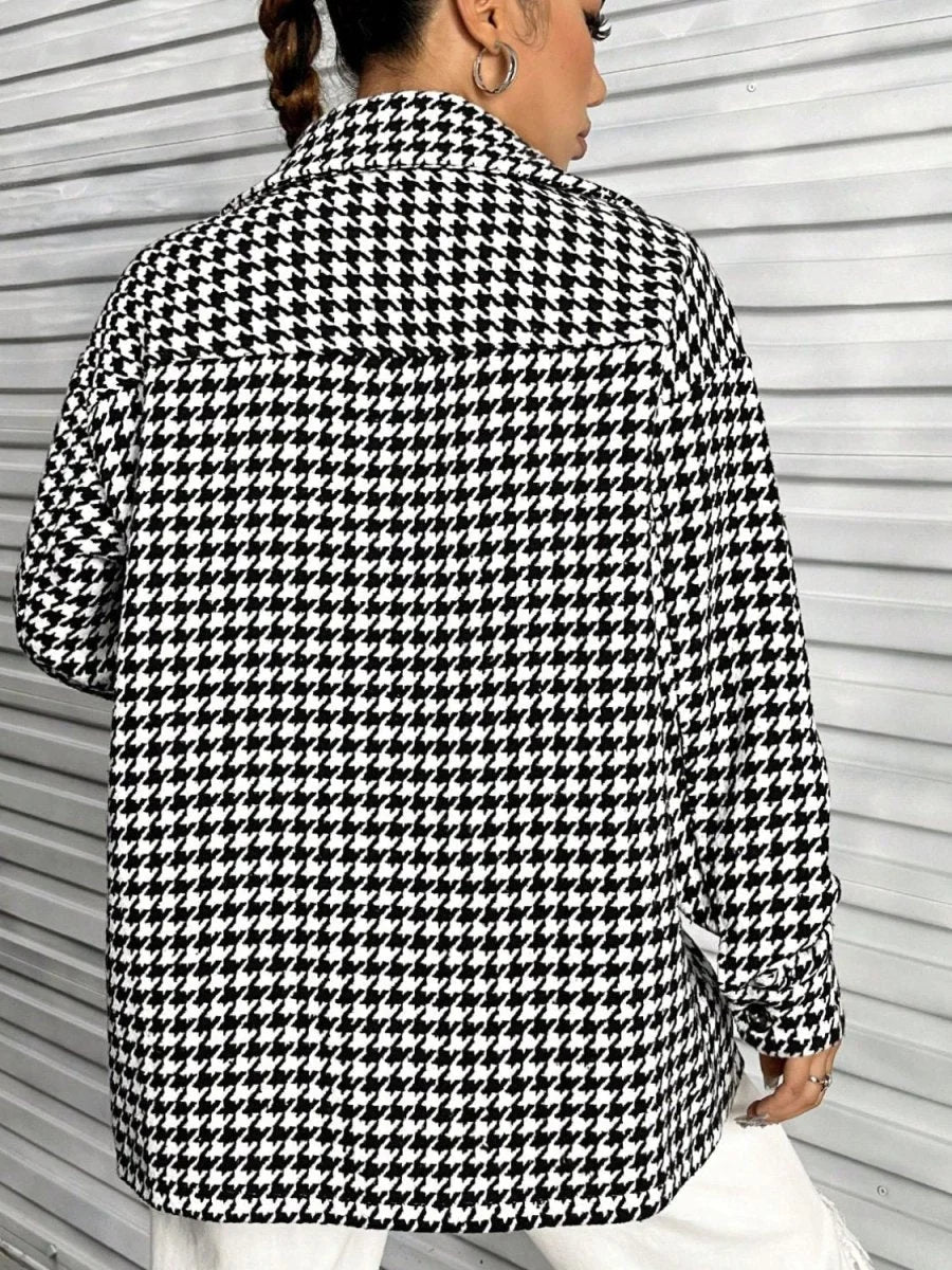 Back view of a black and white houndstooth pattern jacket with a regular fit.