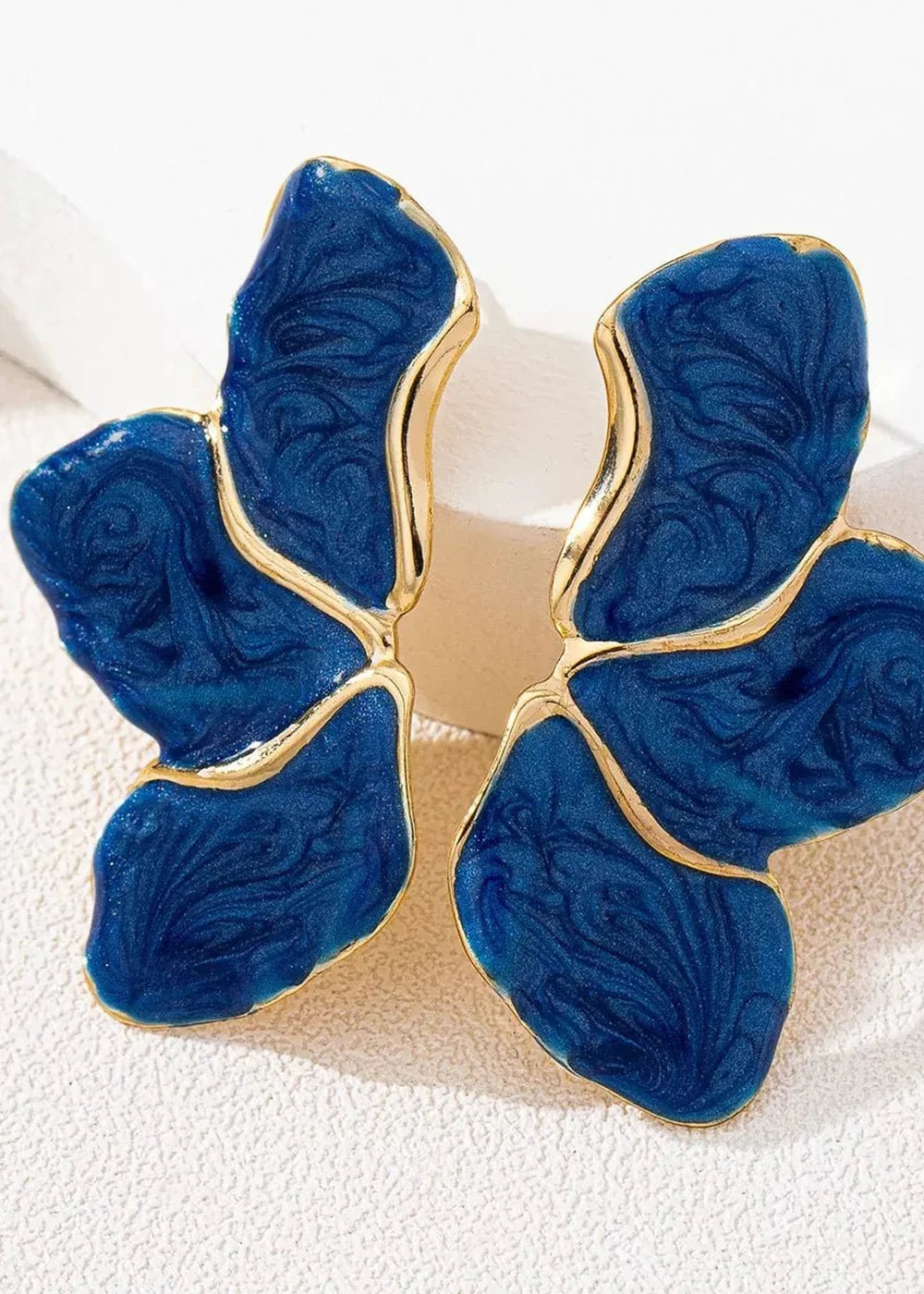 Close-up of resin detail on drop earrings