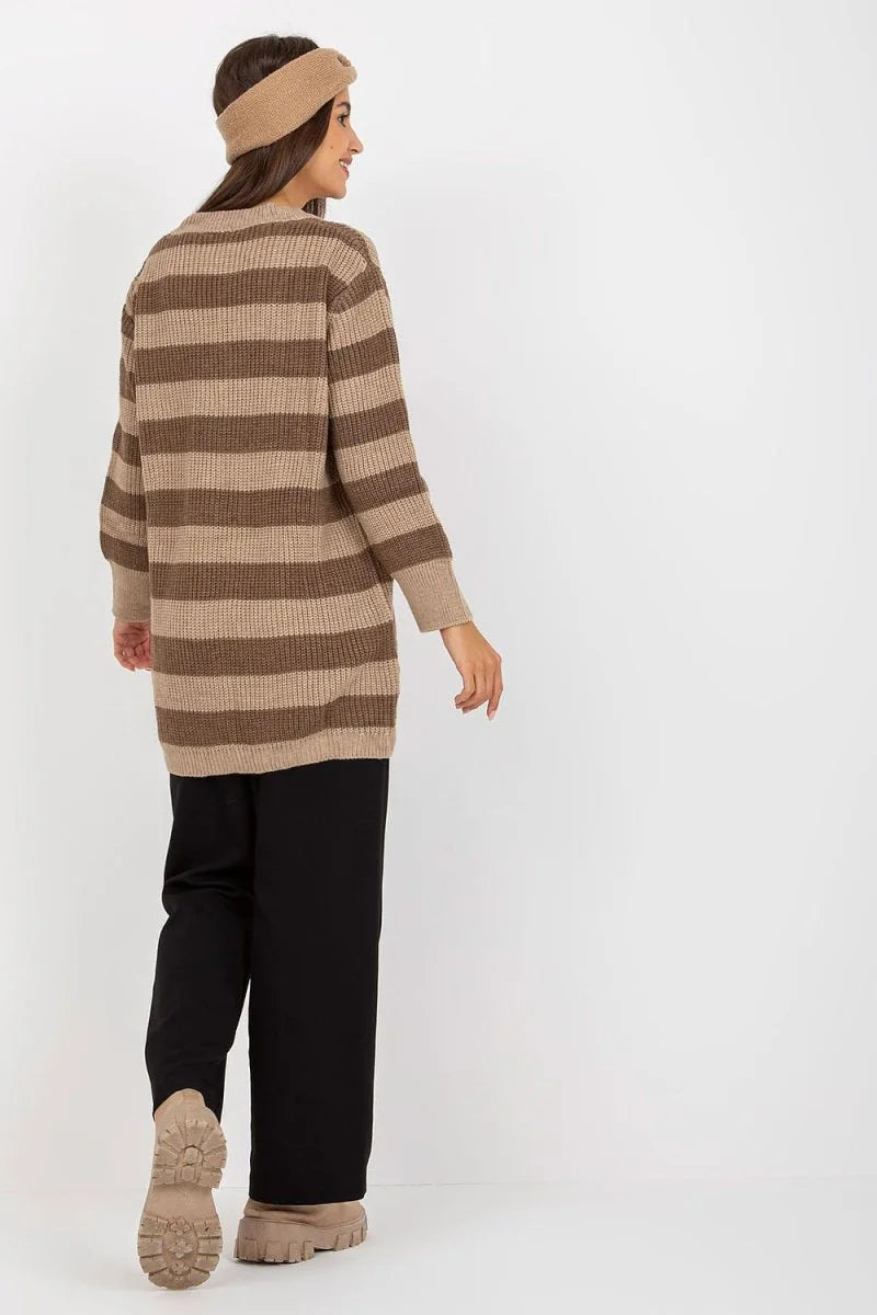 Brown and beige striped knit sweater with a loose fit, worn by a model from the back.