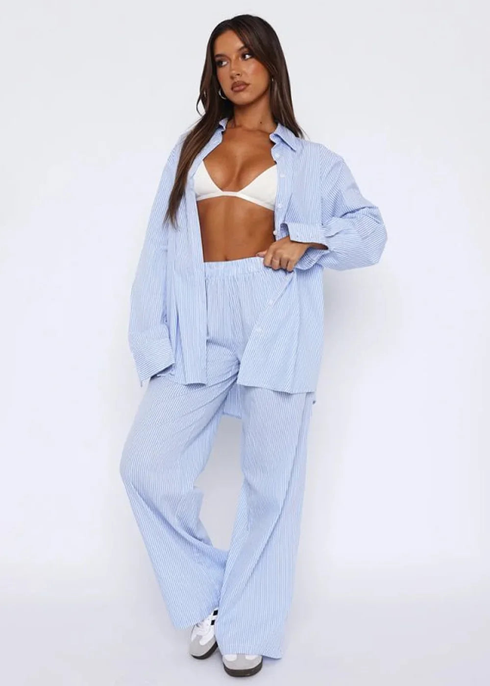 Light blue and white striped wide-leg pants with a comfortable, relaxed fit.