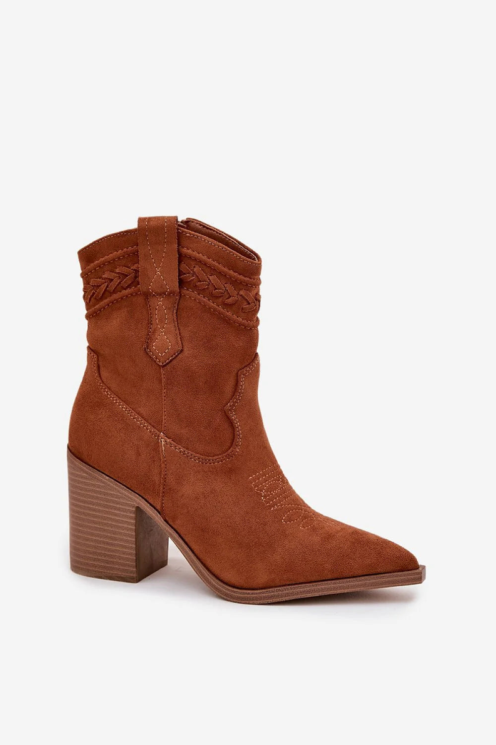 Close-up of decorative stitching on brown ankle boots