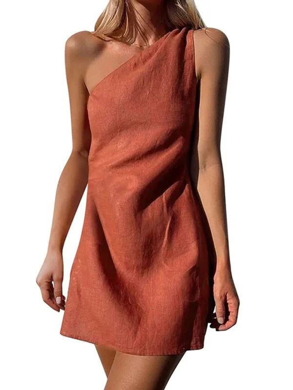 Detail of sloping shoulder on red dress